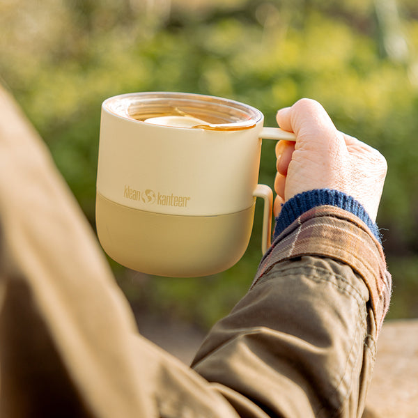 12oz_rise_coffee_mug_waxyellow_hand_closeup_square_600x.jpg