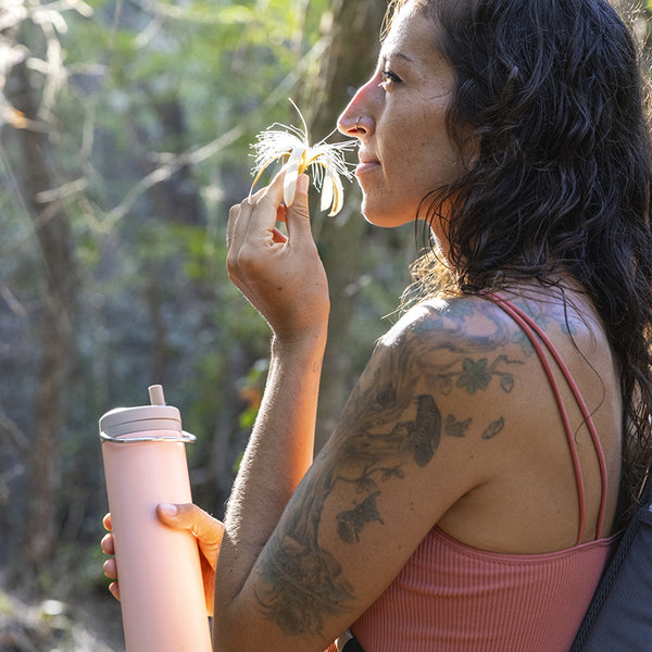 tkwide_20oz_insulated_bottle_twist_woman_flower_costarica_square_600x.jpg